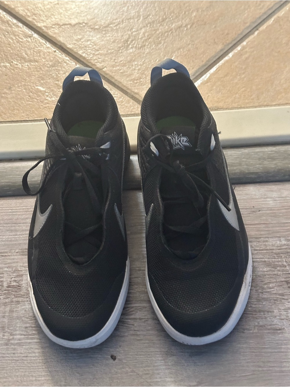 Nike Black Athletic Sneakers with White Swoosh